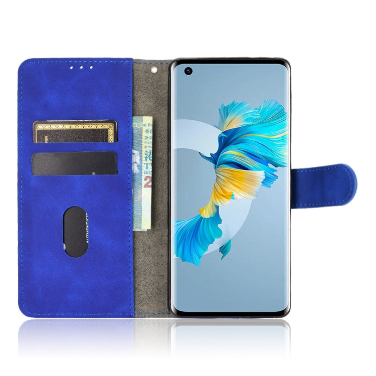 For Huawei Mate 40 Solid Color Skin Feel Magnetic Buckle Horizontal Flip Calf Texture PU Leather Case with Holder & Card Slots & Wallet