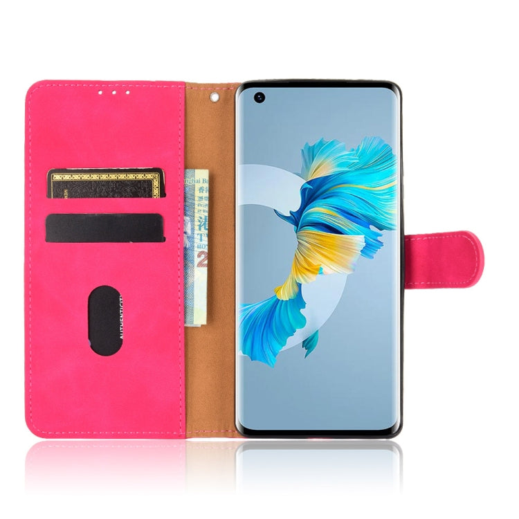 For Huawei Mate 40 Solid Color Skin Feel Magnetic Buckle Horizontal Flip Calf Texture PU Leather Case with Holder & Card Slots & Wallet