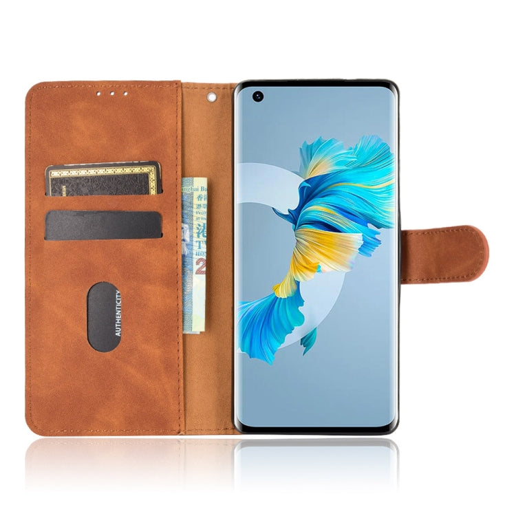 For Huawei Mate 40 Solid Color Skin Feel Magnetic Buckle Horizontal Flip Calf Texture PU Leather Case with Holder & Card Slots & Wallet