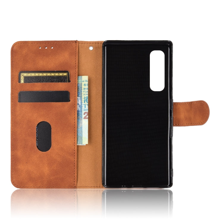 For Fujitsu Arrows NX9 F-52A Solid Color Skin Feel Magnetic Buckle Horizontal Flip Calf Texture PU Leather Case with Holder & Card Slots & Wallet