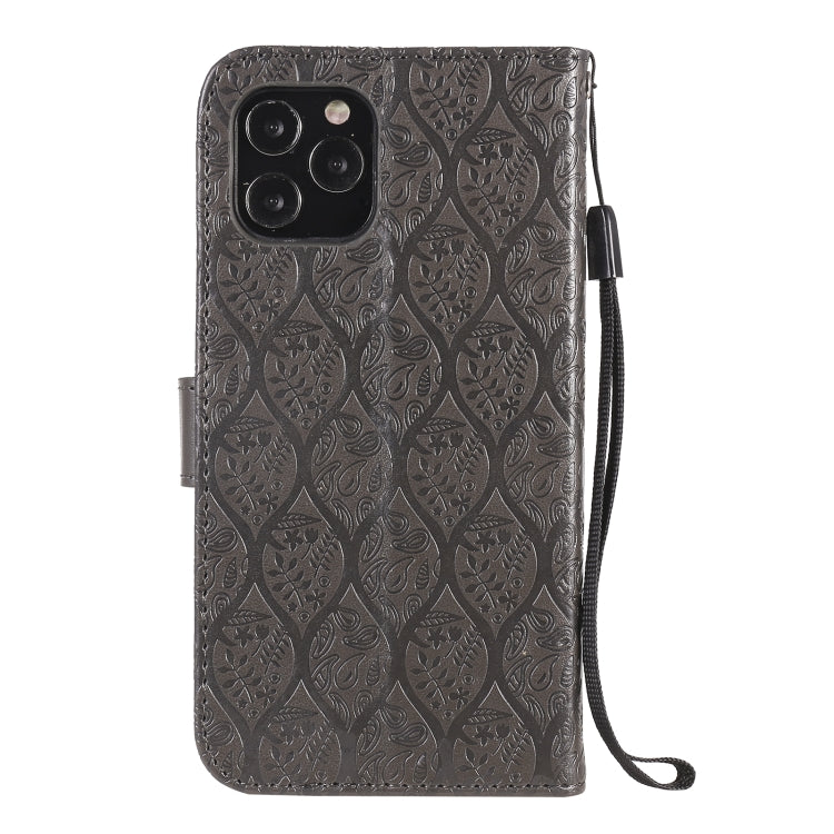 For iPhone 12 / 12 Pro Pressed Printing Rattan Flower Pattern Horizontal Flip PU Leather Case with Holder & Card Slots & Wallet & Photo Frame