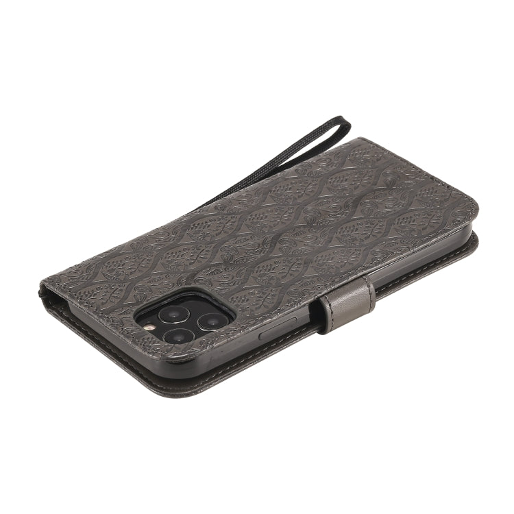For iPhone 12 / 12 Pro Pressed Printing Rattan Flower Pattern Horizontal Flip PU Leather Case with Holder & Card Slots & Wallet & Photo Frame