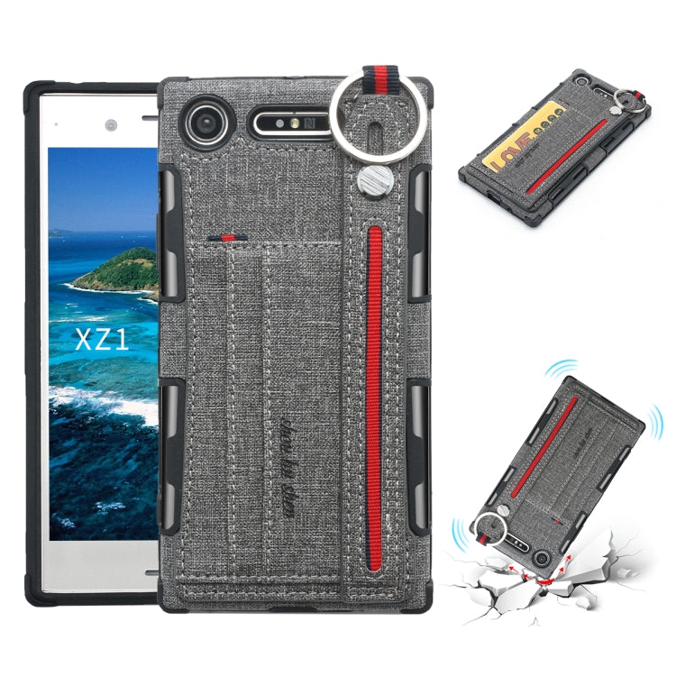 For Sony Xperia XZ1 Cloth Texture + TPU Shockproof Protective Case with Metal Ring & Holder & Card Slots & Hanging Strap