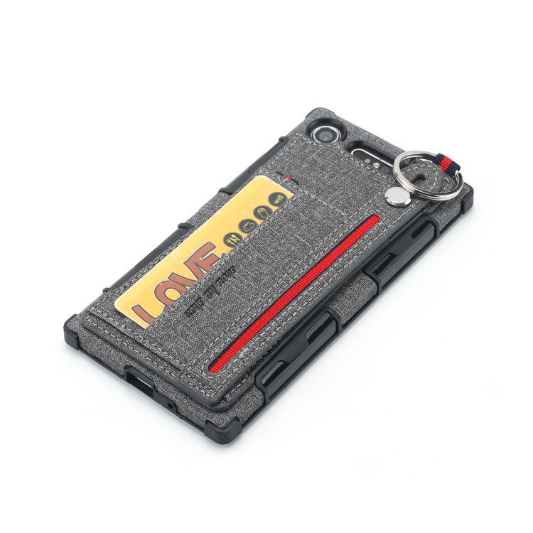 For Sony Xperia XZ1 Cloth Texture + TPU Shockproof Protective Case with Metal Ring & Holder & Card Slots & Hanging Strap