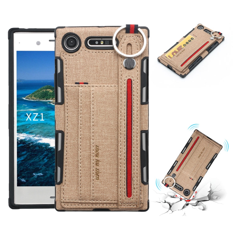 For Sony Xperia XZ1 Cloth Texture + TPU Shockproof Protective Case with Metal Ring & Holder & Card Slots & Hanging Strap