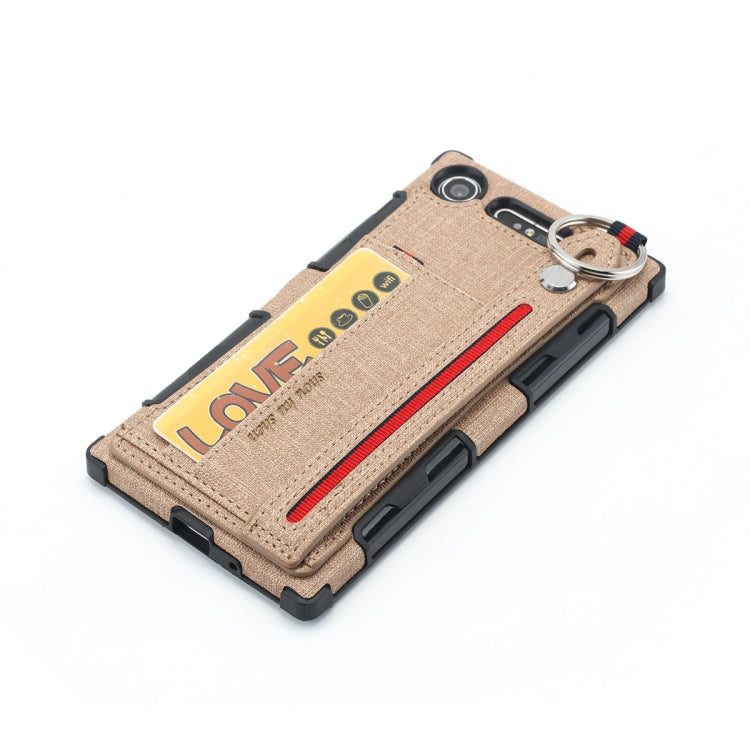 For Sony Xperia XZ1 Cloth Texture + TPU Shockproof Protective Case with Metal Ring & Holder & Card Slots & Hanging Strap