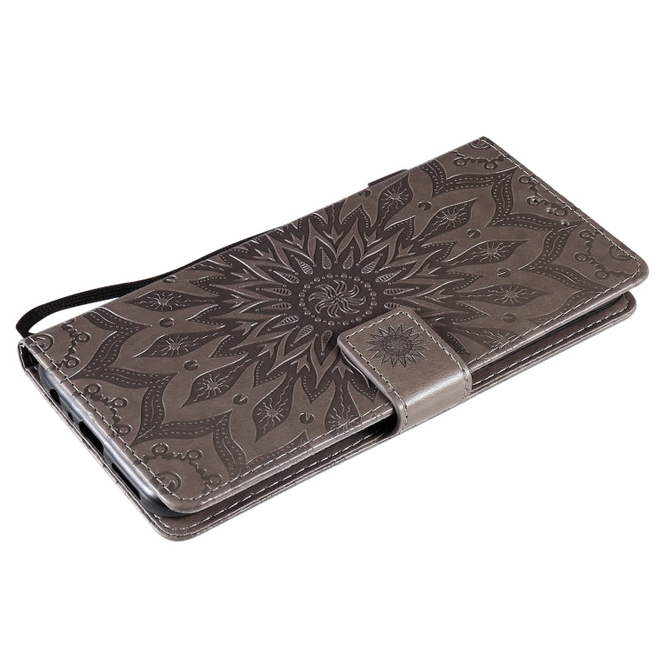 For OnePlus Nord N100 Sun Embossing Pattern Horizontal Flip Leather Case with Card Slot & Holder & Wallet & Lanyard