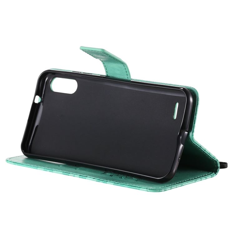 For LG K22 / K22 Plus Sun Embossing Pattern Horizontal Flip Leather Case with Card Slot & Holder & Wallet & Lanyard