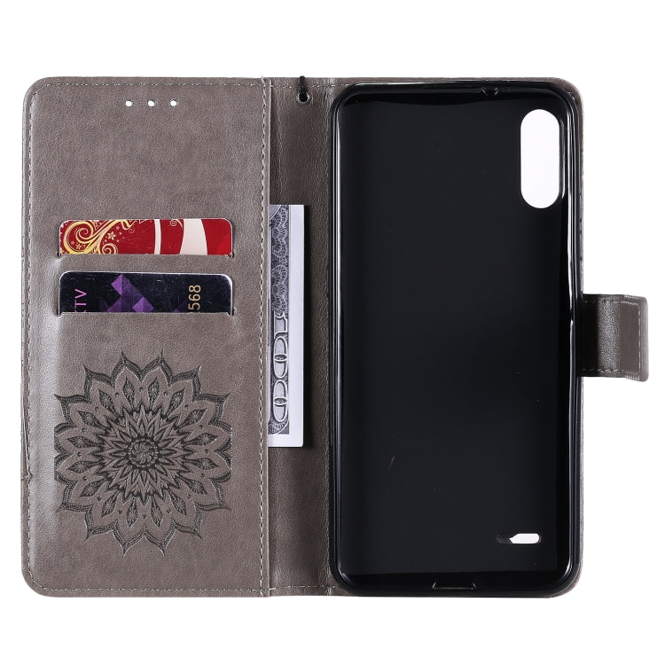 For LG K22 / K22 Plus Sun Embossing Pattern Horizontal Flip Leather Case with Card Slot & Holder & Wallet & Lanyard
