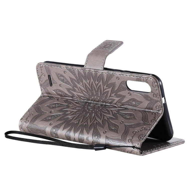 For LG K22 / K22 Plus Sun Embossing Pattern Horizontal Flip Leather Case with Card Slot & Holder & Wallet & Lanyard