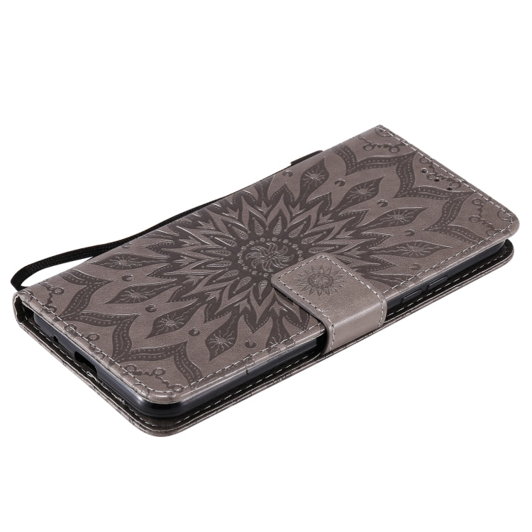 For LG K22 / K22 Plus Sun Embossing Pattern Horizontal Flip Leather Case with Card Slot & Holder & Wallet & Lanyard