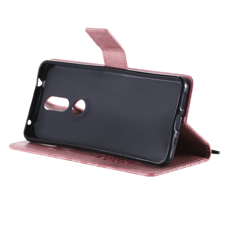 For Nokia 2.4 Sun Embossing Pattern Horizontal Flip Leather Case with Card Slot & Holder & Wallet & Lanyard