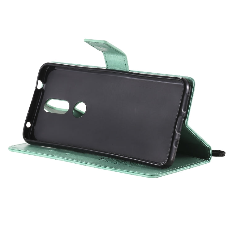 For Nokia 2.4 Sun Embossing Pattern Horizontal Flip Leather Case with Card Slot & Holder & Wallet & Lanyard