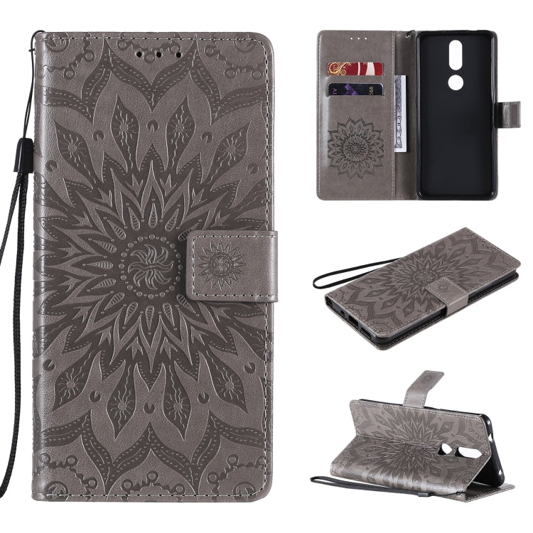 For Nokia 2.4 Sun Embossing Pattern Horizontal Flip Leather Case with Card Slot & Holder & Wallet & Lanyard