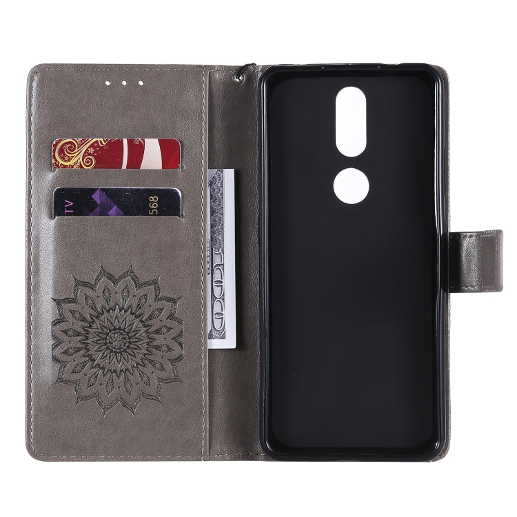 For Nokia 2.4 Sun Embossing Pattern Horizontal Flip Leather Case with Card Slot & Holder & Wallet & Lanyard