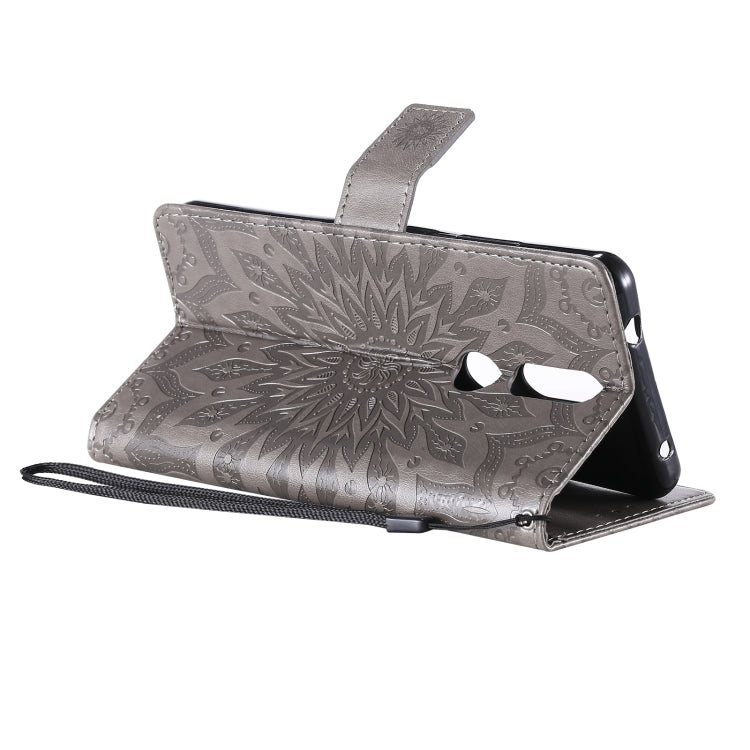 For Nokia 2.4 Sun Embossing Pattern Horizontal Flip Leather Case with Card Slot & Holder & Wallet & Lanyard