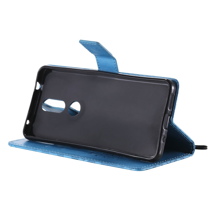 For Nokia 2.4 Sun Embossing Pattern Horizontal Flip Leather Case with Card Slot & Holder & Wallet & Lanyard