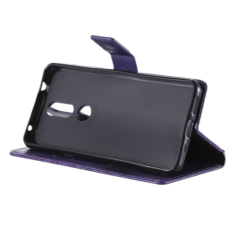 For Nokia 2.4 Sun Embossing Pattern Horizontal Flip Leather Case with Card Slot & Holder & Wallet & Lanyard