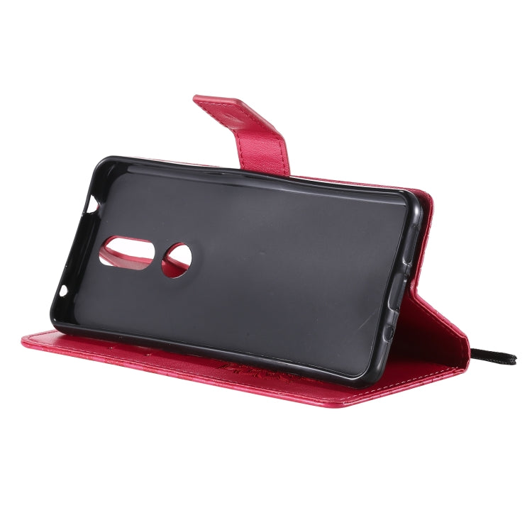 For Nokia 2.4 Sun Embossing Pattern Horizontal Flip Leather Case with Card Slot & Holder & Wallet & Lanyard