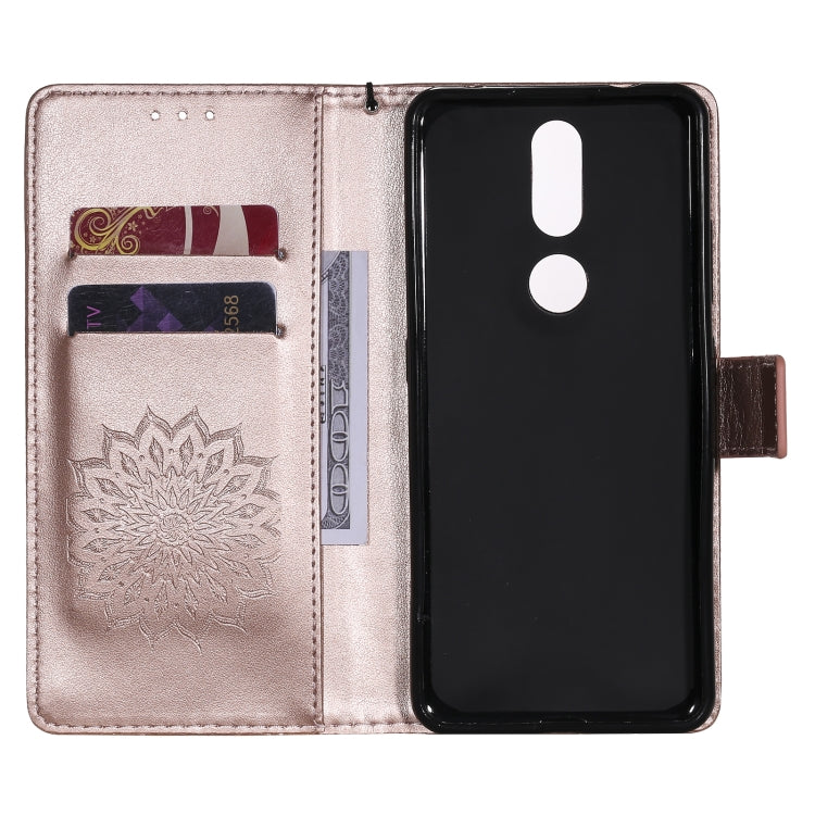 For Nokia 2.4 Sun Embossing Pattern Horizontal Flip Leather Case with Card Slot & Holder & Wallet & Lanyard