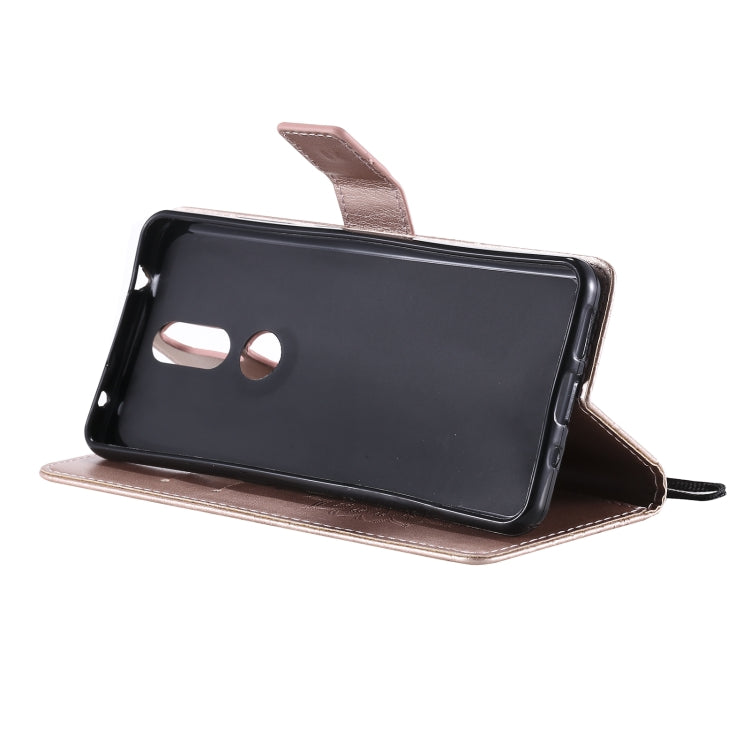 For Nokia 2.4 Sun Embossing Pattern Horizontal Flip Leather Case with Card Slot & Holder & Wallet & Lanyard