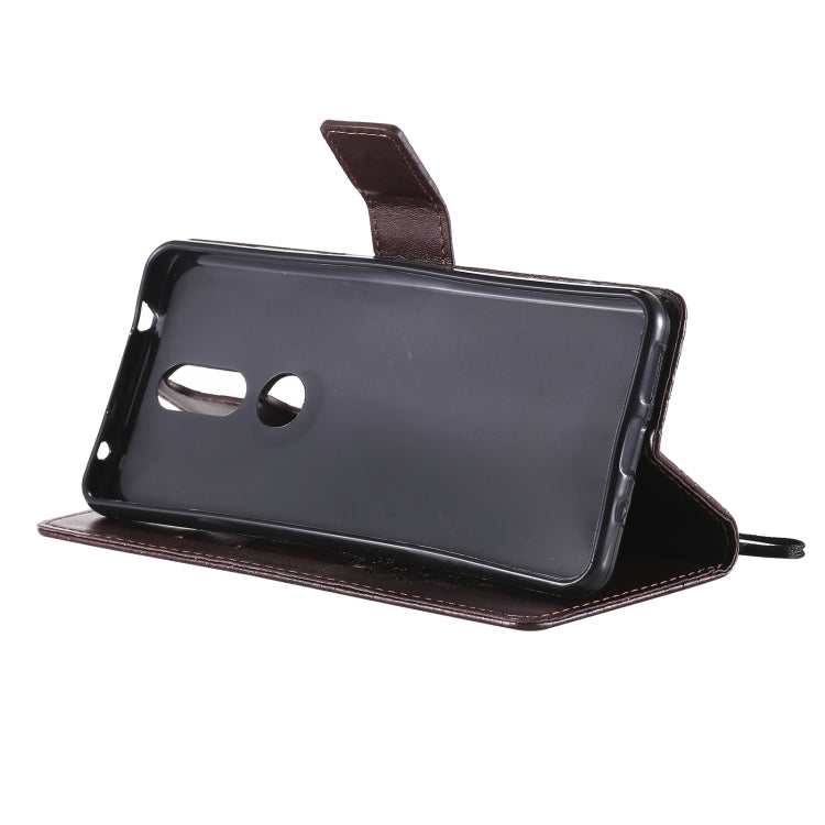 For Nokia 2.4 Sun Embossing Pattern Horizontal Flip Leather Case with Card Slot & Holder & Wallet & Lanyard