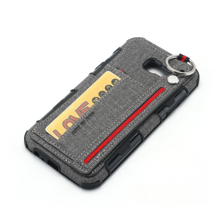 For Galaxy A7 (2017) Cloth Texture + TPU Shockproof Protective Case with Metal Ring & Holder & Card Slots & Hanging Strap