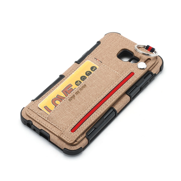 For Galaxy J4+ Cloth Texture + TPU Shockproof Protective Case with Metal Ring & Holder & Card Slots & Hanging Strap