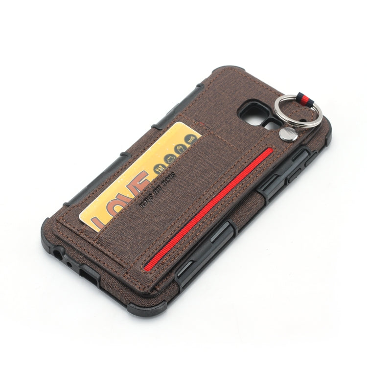 For Galaxy J4+ Cloth Texture + TPU Shockproof Protective Case with Metal Ring & Holder & Card Slots & Hanging Strap