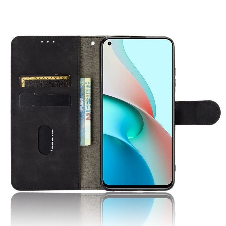 For Xiaomi Redmi Note 9 5G Solid Color Skin Feel Magnetic Buckle Horizontal Flip Calf Texture PU Leather Case with Holder & Card Slots & Wallet