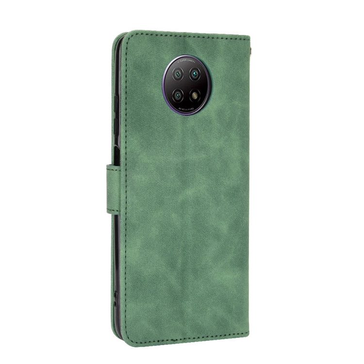 For Xiaomi Redmi Note 9 5G Solid Color Skin Feel Magnetic Buckle Horizontal Flip Calf Texture PU Leather Case with Holder & Card Slots & Wallet