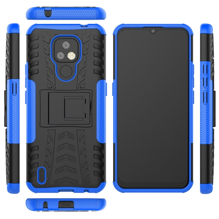 For Motorola Moto E7 Tire Texture Shockproof TPU+PC Protective Case with Holder