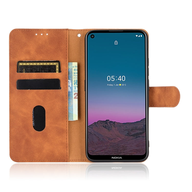 For Nokia 5.4 Solid Color Skin Feel Magnetic Buckle Horizontal Flip Calf Texture PU Leather Case with Holder & Card Slots & Wallet