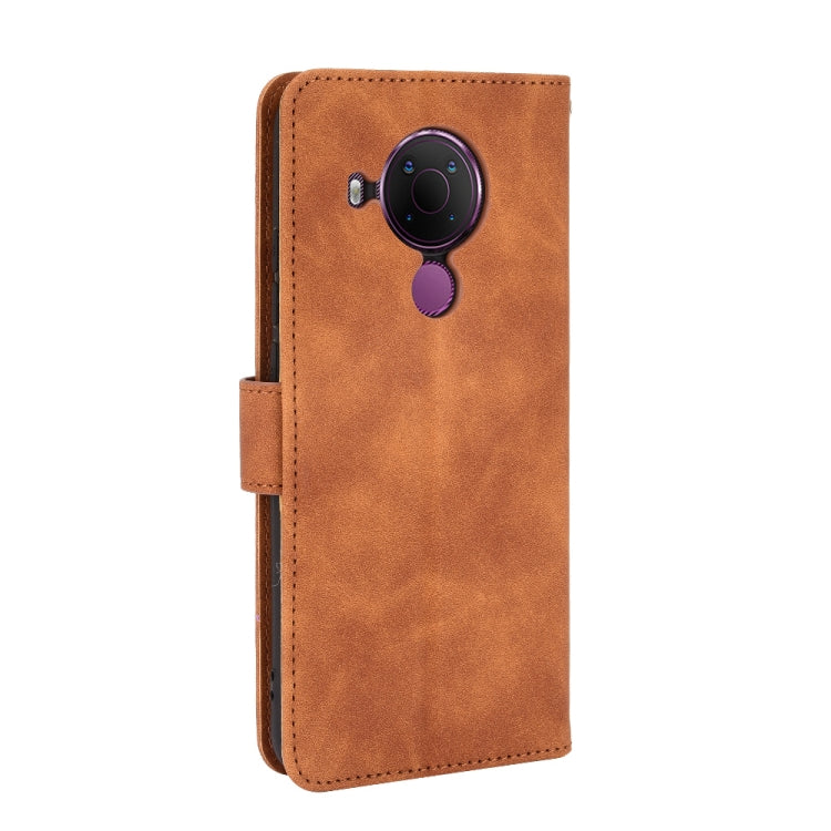 For Nokia 5.4 Solid Color Skin Feel Magnetic Buckle Horizontal Flip Calf Texture PU Leather Case with Holder & Card Slots & Wallet