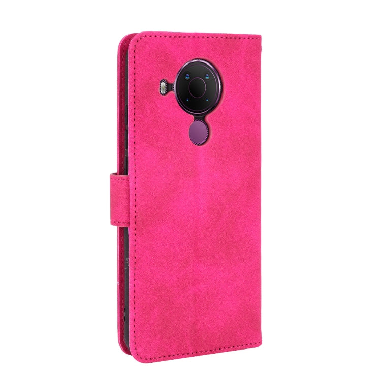For Nokia 5.4 Solid Color Skin Feel Magnetic Buckle Horizontal Flip Calf Texture PU Leather Case with Holder & Card Slots & Wallet