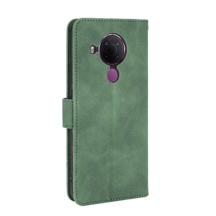 For Nokia 5.4 Solid Color Skin Feel Magnetic Buckle Horizontal Flip Calf Texture PU Leather Case with Holder & Card Slots & Wallet