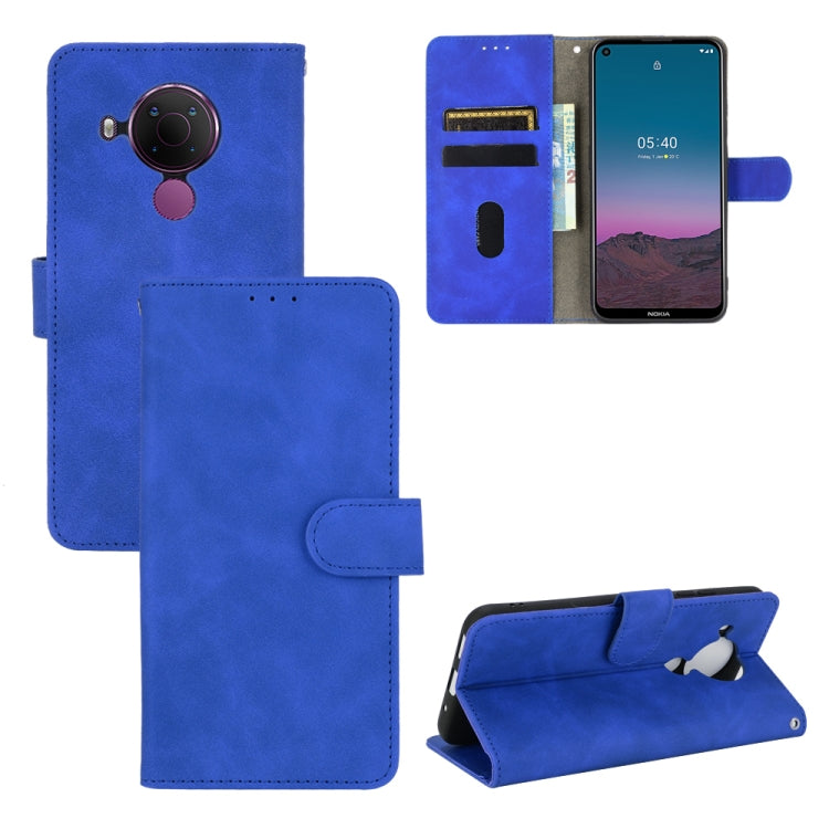 For Nokia 5.4 Solid Color Skin Feel Magnetic Buckle Horizontal Flip Calf Texture PU Leather Case with Holder & Card Slots & Wallet