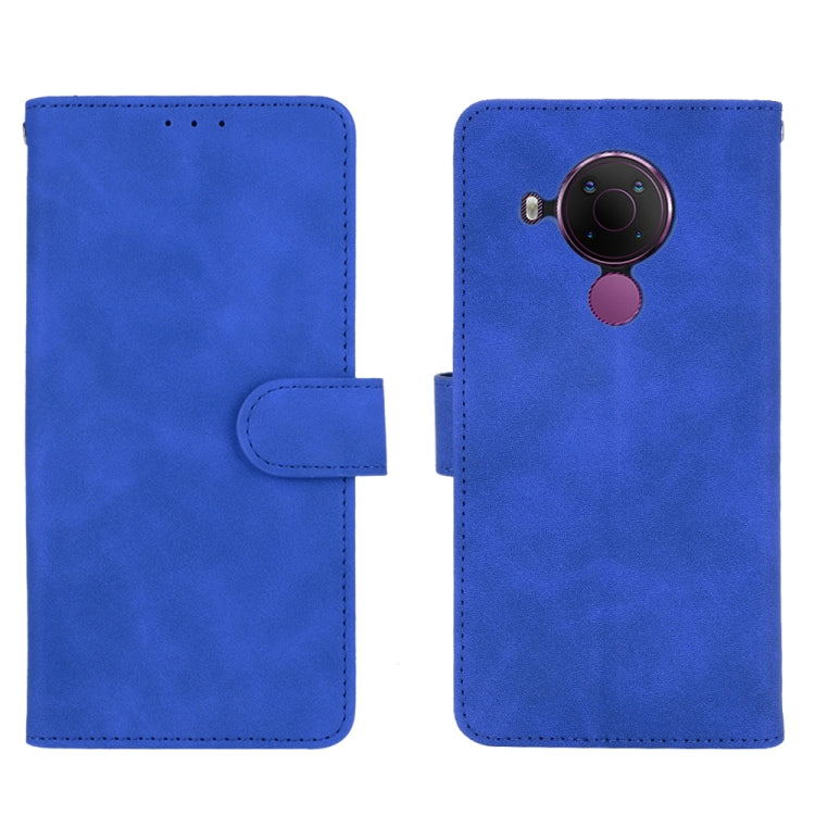 For Nokia 5.4 Solid Color Skin Feel Magnetic Buckle Horizontal Flip Calf Texture PU Leather Case with Holder & Card Slots & Wallet