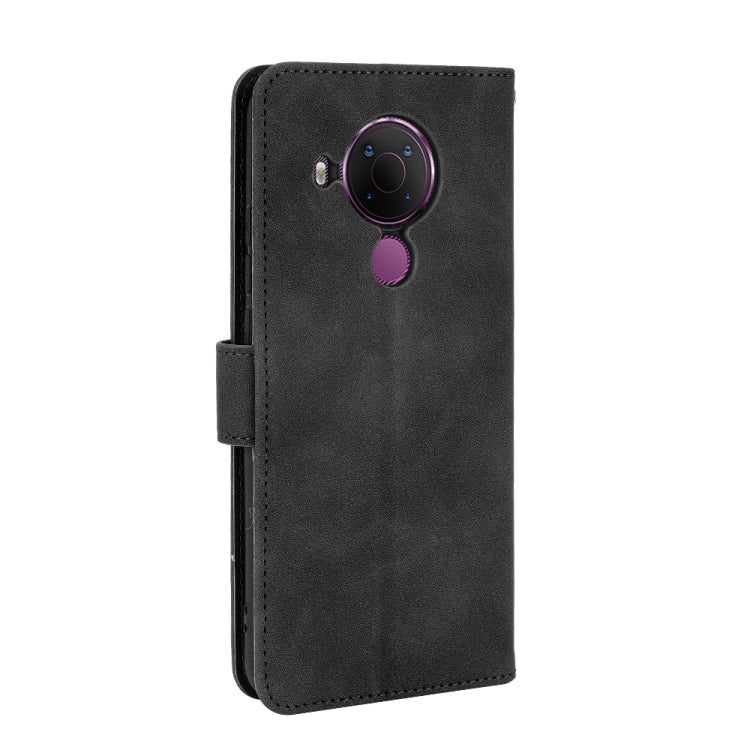 For Nokia 5.4 Solid Color Skin Feel Magnetic Buckle Horizontal Flip Calf Texture PU Leather Case with Holder & Card Slots & Wallet