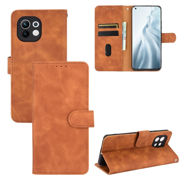 For Xiaomi Mi 11 Solid Color Skin Feel Magnetic Buckle Horizontal Flip Calf Texture PU Leather Case with Holder & Card Slots & Wallet