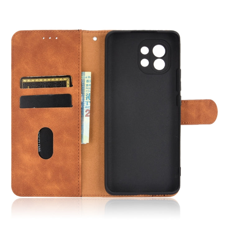 For Xiaomi Mi 11 Solid Color Skin Feel Magnetic Buckle Horizontal Flip Calf Texture PU Leather Case with Holder & Card Slots & Wallet
