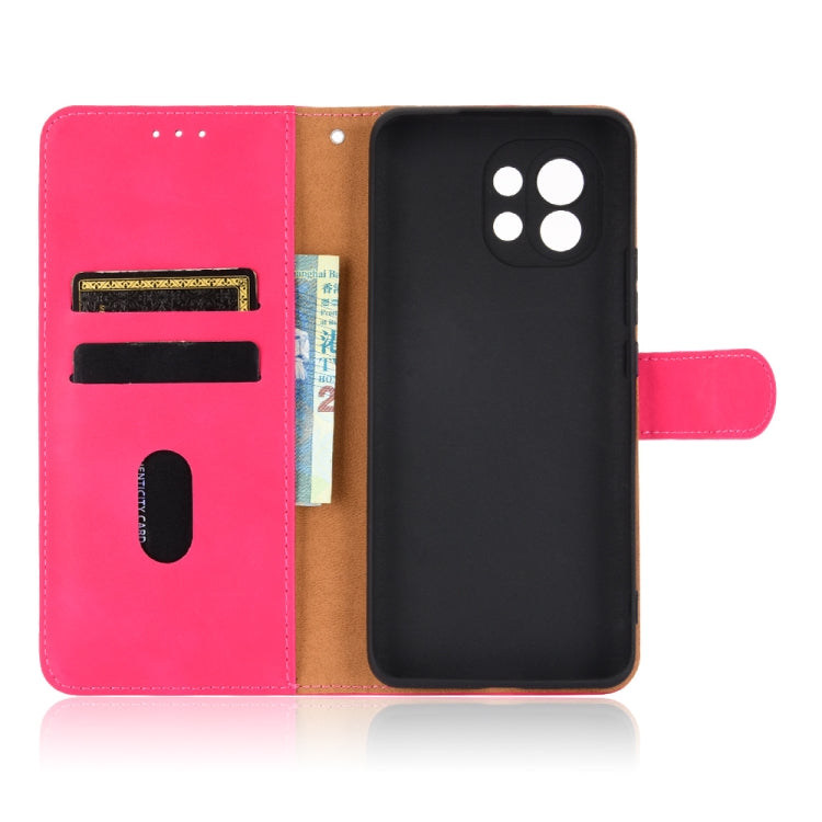 For Xiaomi Mi 11 Solid Color Skin Feel Magnetic Buckle Horizontal Flip Calf Texture PU Leather Case with Holder & Card Slots & Wallet