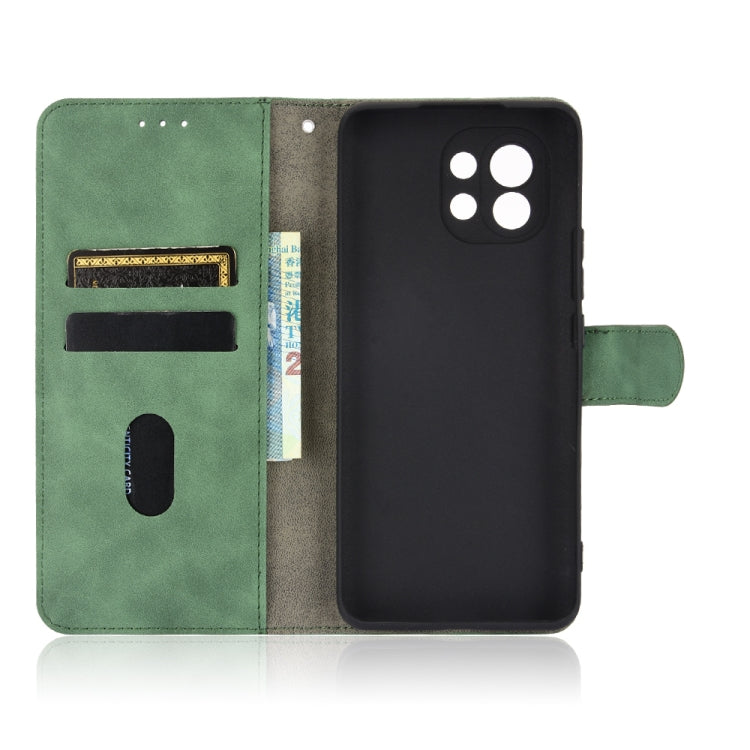 For Xiaomi Mi 11 Solid Color Skin Feel Magnetic Buckle Horizontal Flip Calf Texture PU Leather Case with Holder & Card Slots & Wallet