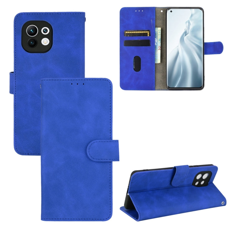 For Xiaomi Mi 11 Solid Color Skin Feel Magnetic Buckle Horizontal Flip Calf Texture PU Leather Case with Holder & Card Slots & Wallet