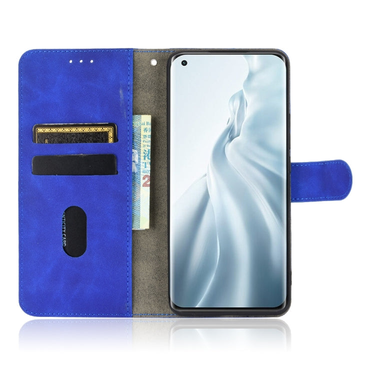 For Xiaomi Mi 11 Solid Color Skin Feel Magnetic Buckle Horizontal Flip Calf Texture PU Leather Case with Holder & Card Slots & Wallet
