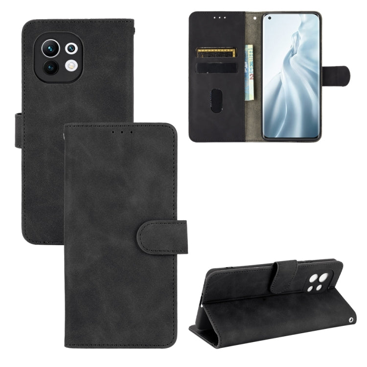 For Xiaomi Mi 11 Solid Color Skin Feel Magnetic Buckle Horizontal Flip Calf Texture PU Leather Case with Holder & Card Slots & Wallet