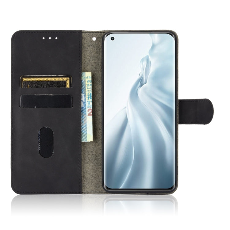 For Xiaomi Mi 11 Solid Color Skin Feel Magnetic Buckle Horizontal Flip Calf Texture PU Leather Case with Holder & Card Slots & Wallet