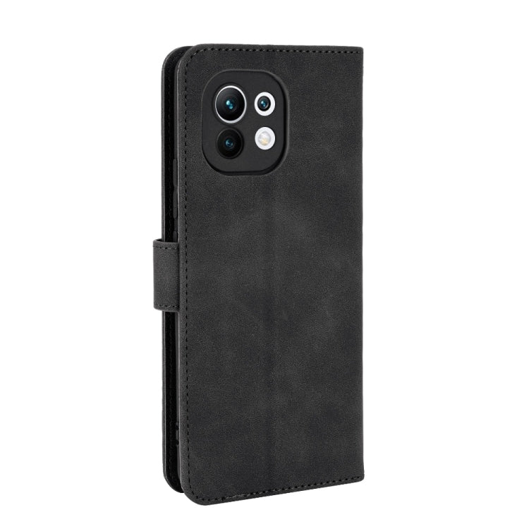 For Xiaomi Mi 11 Solid Color Skin Feel Magnetic Buckle Horizontal Flip Calf Texture PU Leather Case with Holder & Card Slots & Wallet