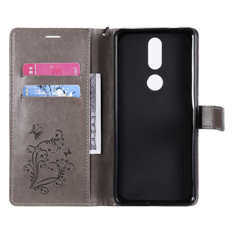 For Nokia 2.4 3D Butterflies Embossing Pattern Horizontal Flip Leather Case with Holder & Card Slot & Wallet
