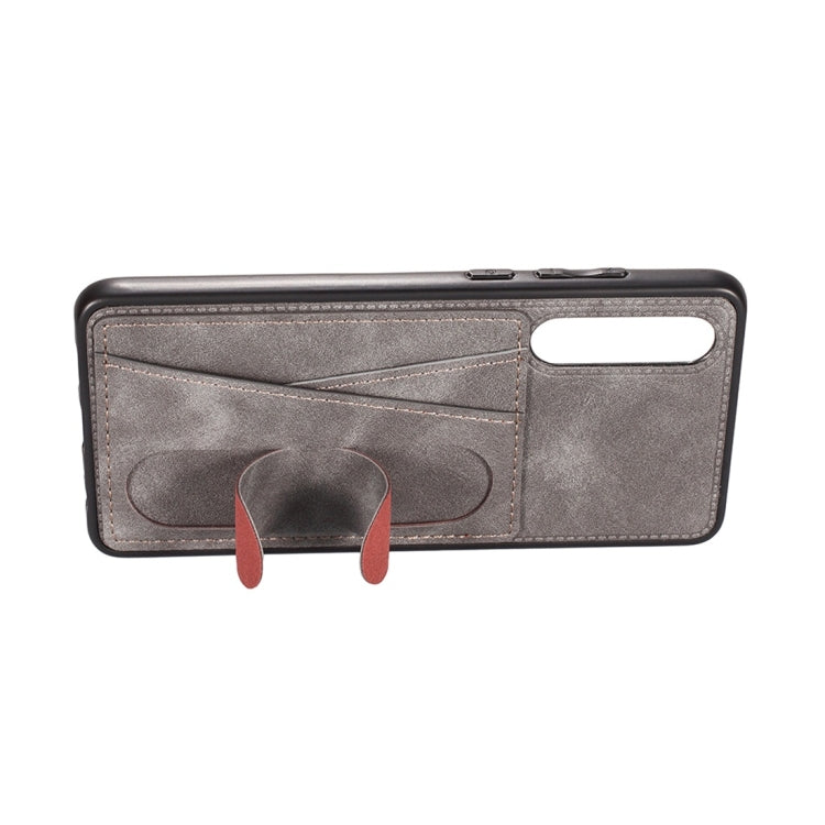 For Huawei P30 Shockproof PC + PU Protective Case with Spring Holder & Card Slot